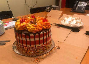 Colorful cake and dedicate pie to celebrate National Boss's Day.