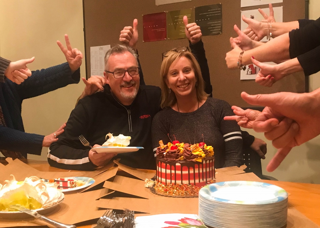 Rick and Janey Zoltun in a sea of hands that are showing appreciation for them on their honorary day.