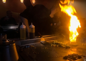 Onion volcano on Hibachi shoots fire.